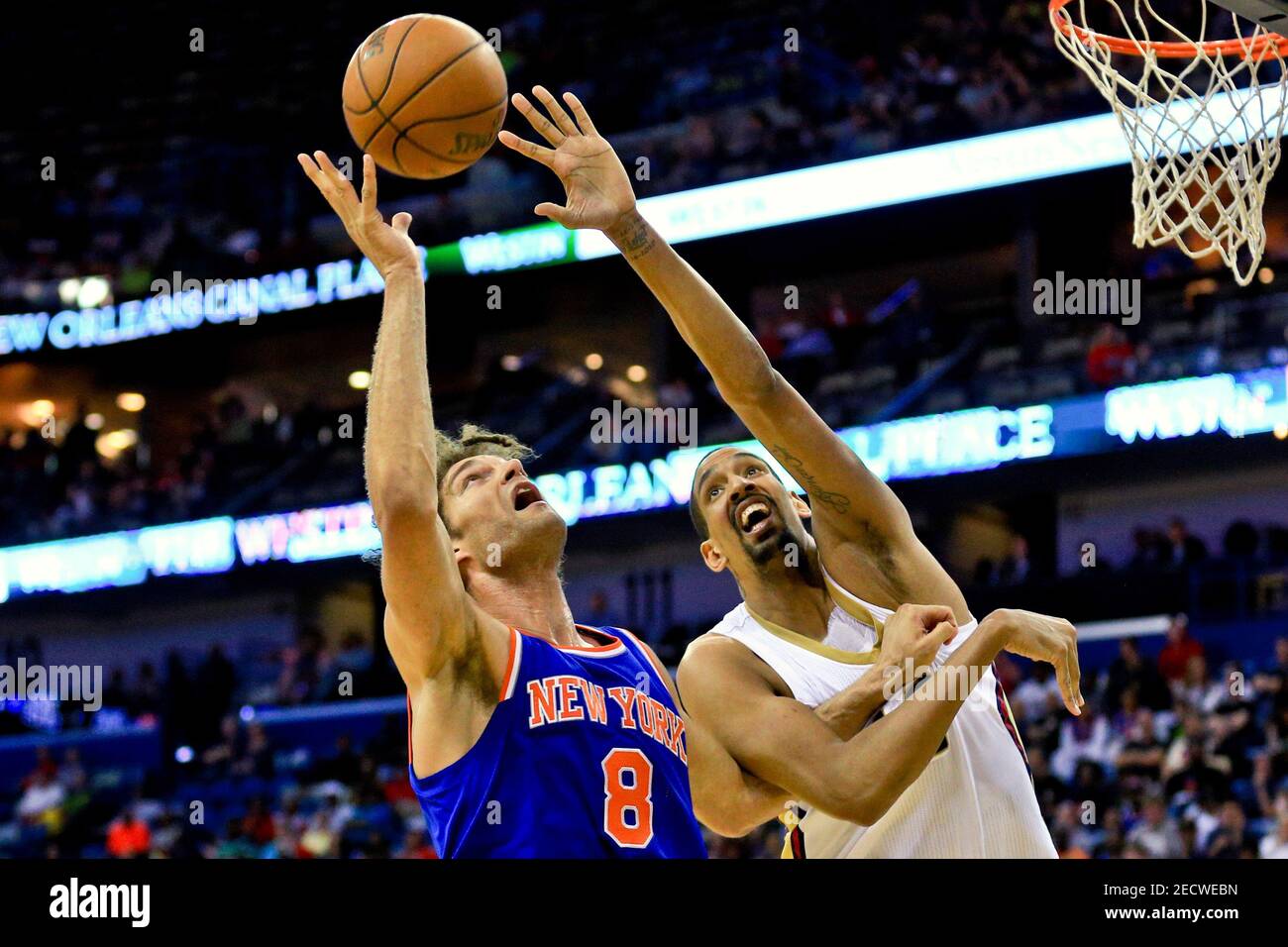 Mar 28, 2016; New Orleans, LA, USA; New York Knicks center Robin Lopez (8) and New Orleans Pelicans center Alexis Ajinca (42) battle for a rebound during the second quarter of a game at the Smoothie King Center. Mandatory Credit: Derick E. Hingle-USA TODAY Sports  / Reuters  Picture Supplied by Action Images   (TAGS: Sport Basketball NBA) *** Local Caption *** 2016-03-29T013451Z 618645558 NOCID RTRMADP 3 NBA-NEW-YORK-KNICKS-AT-NEW-ORLEANS-PELICANS.JPG Stock Photo