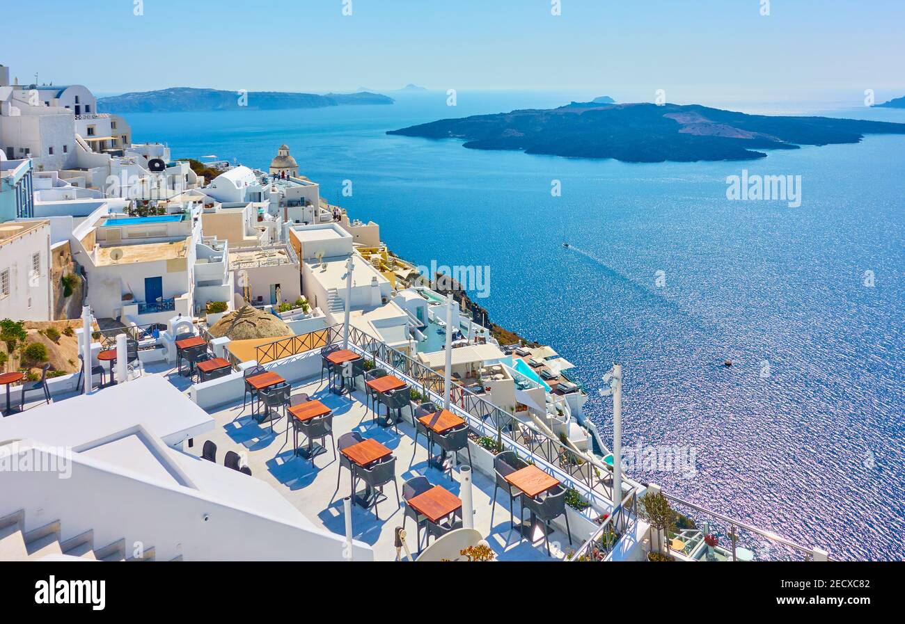 Santorini in Greece. View of Fira town on the slope by the sea. Famous greek resort, spring landscape Stock Photo