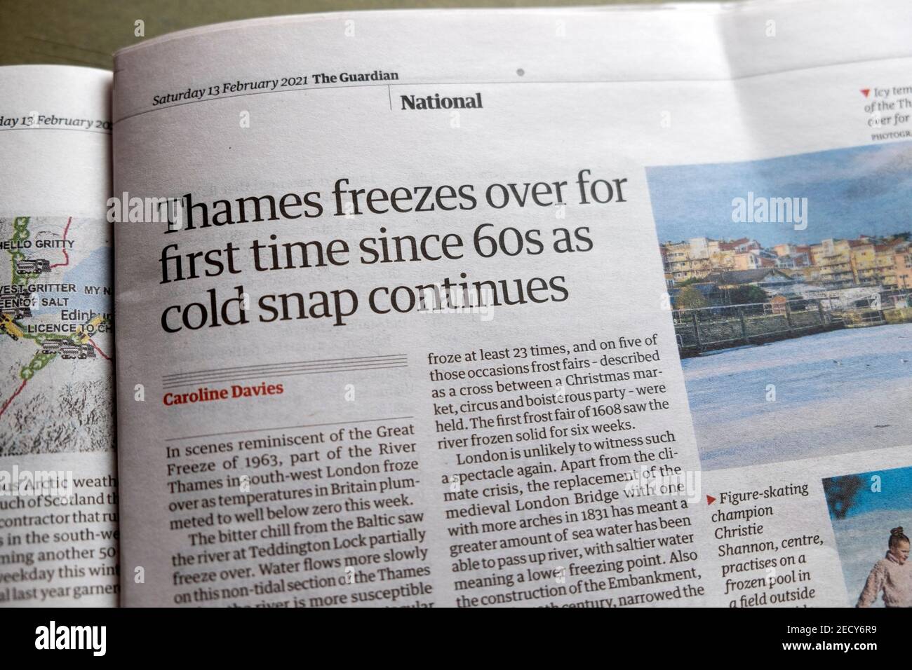 'Thames freezes over for first time since 60s as cold snap continues' Guardian newspaper headline winter weather article 13 February 2021 London UK Stock Photo