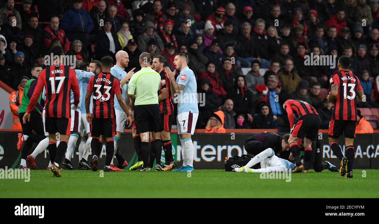 Soccer Football - Premier League - AFC Bournemouth vs West Ham United -  Vitality Stadium, Bournemouth, Britain - December 26, 2017 Players clash  and appeal to referee Stuart Attwell as West Ham
