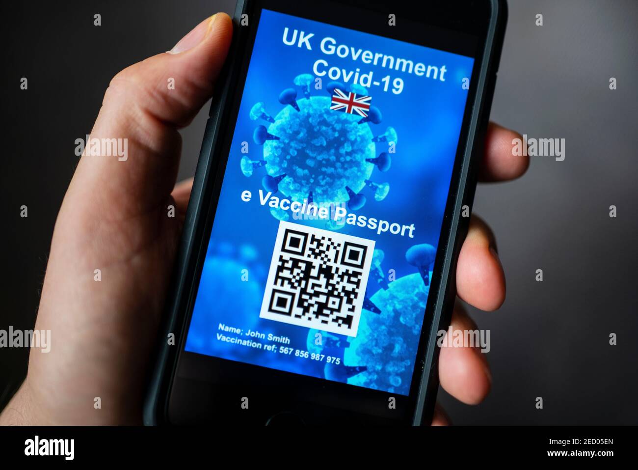 Conceptual design of possible UK electronic Covid-19 vaccination passport using QR code on a smart phone. Stock Photo