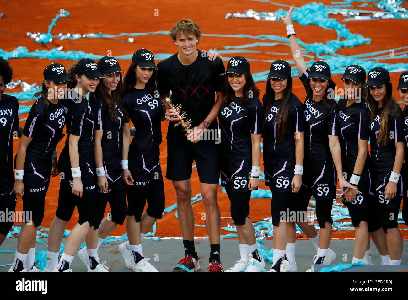 Tennis - ATP 1000 - Madrid Open - Madrid, Spain - May 13, 2018 Germany's  Alexander Zverev celebrates with the trophy and ball girls after winning  the final against Austria's Dominic Thiem REUTERS/Paul Hanna Stock Photo -  Alamy