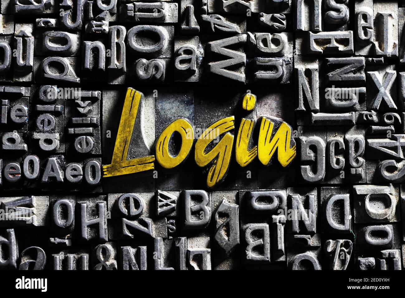 Old lead letters with golden writing, word Login Stock Photo
