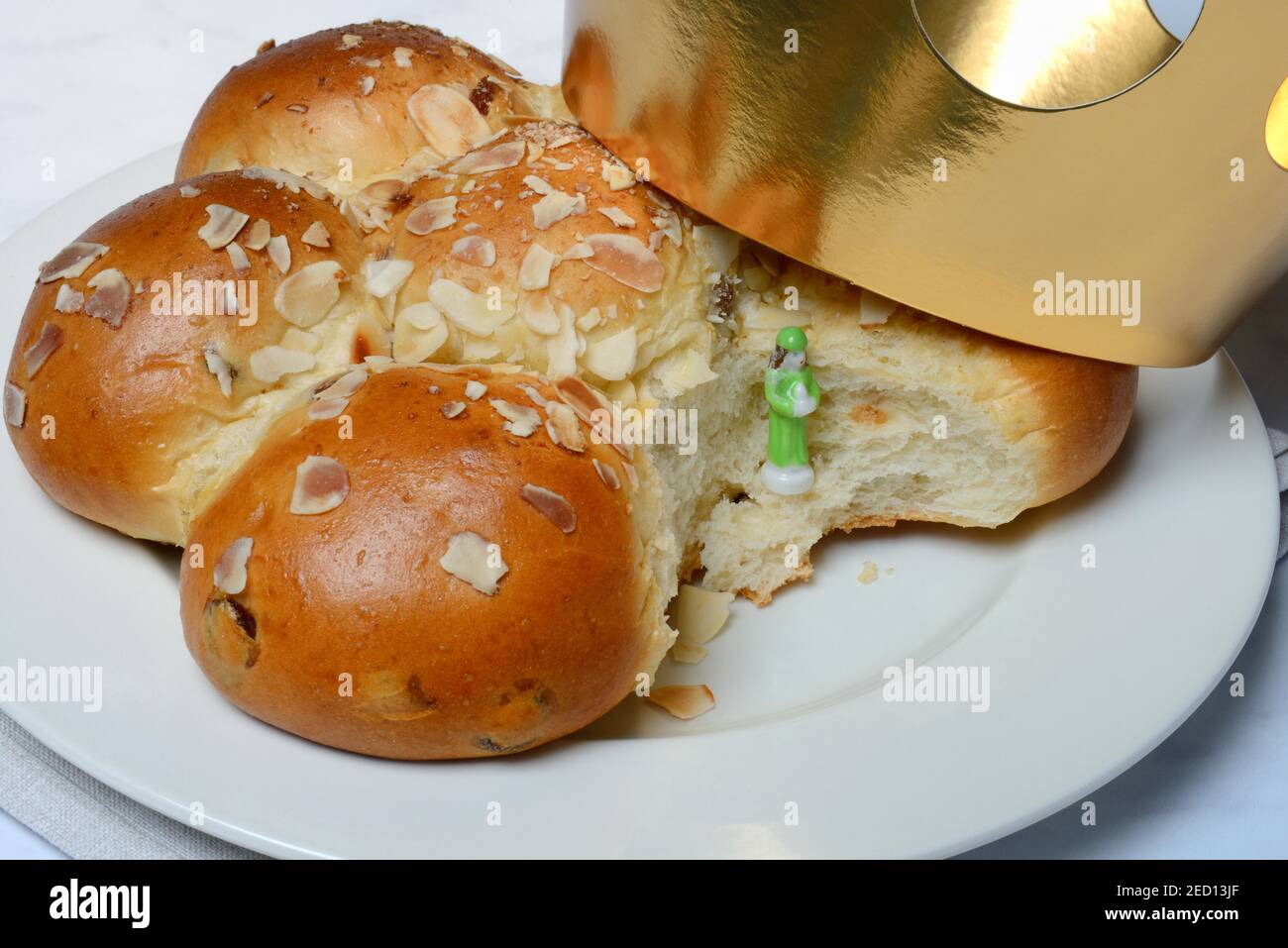 Epiphany cake with king and crown, Switzerland Stock Photo