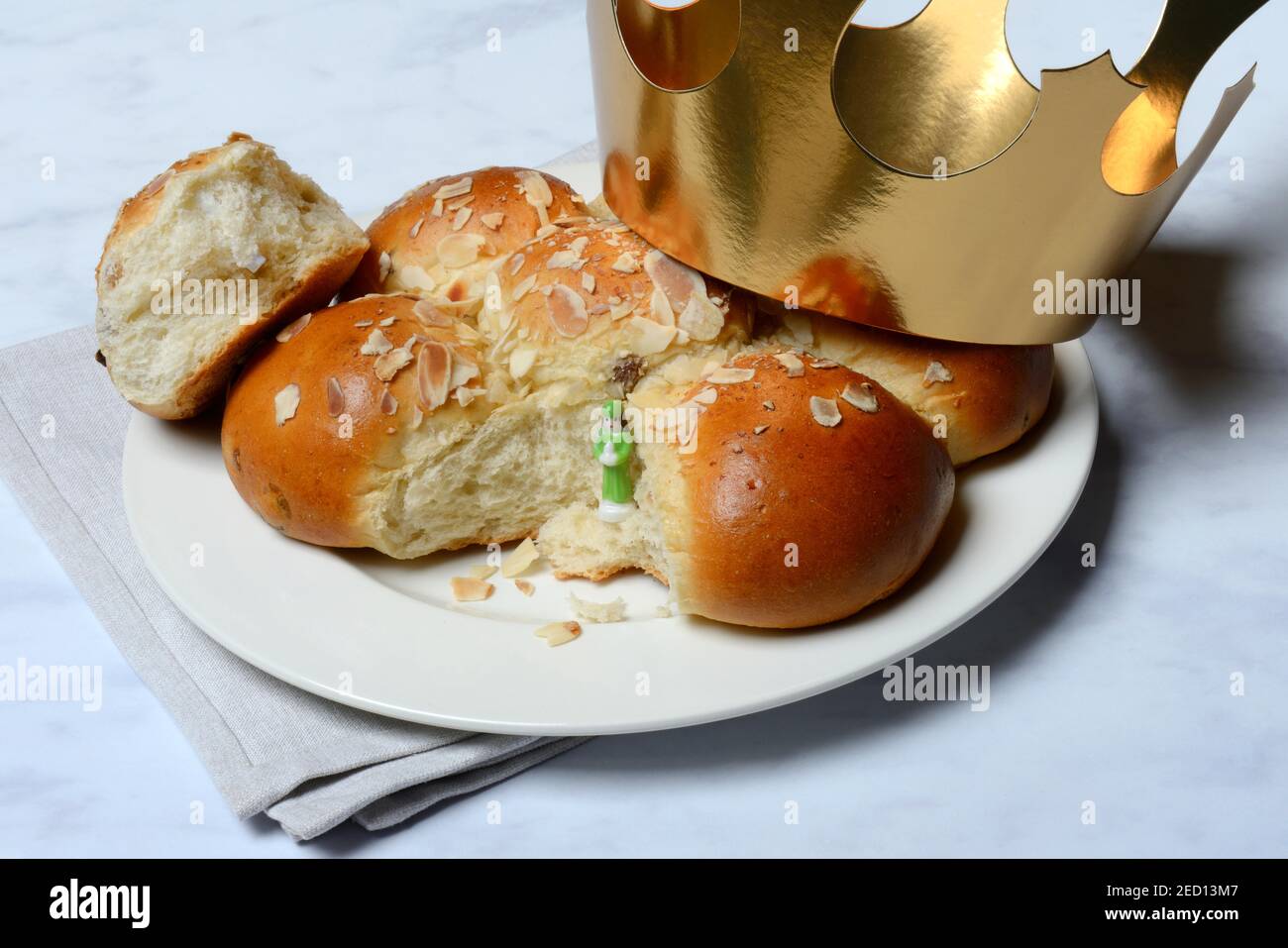 Epiphany cake with king and crown, Switzerland Stock Photo