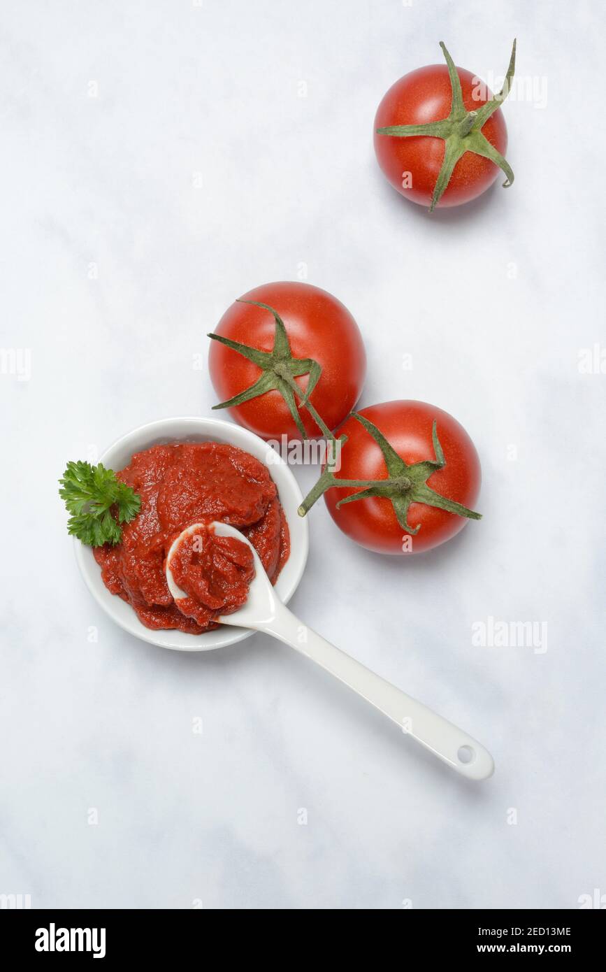 Tomato paste in skin, tomatoes, Germany Stock Photo Alamy