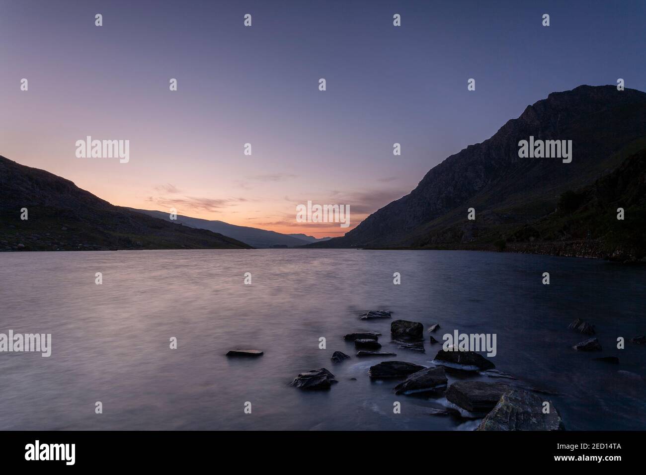 Dawn breaking over Llyn Ogwen, Snowdonia, North Wales Stock Photo