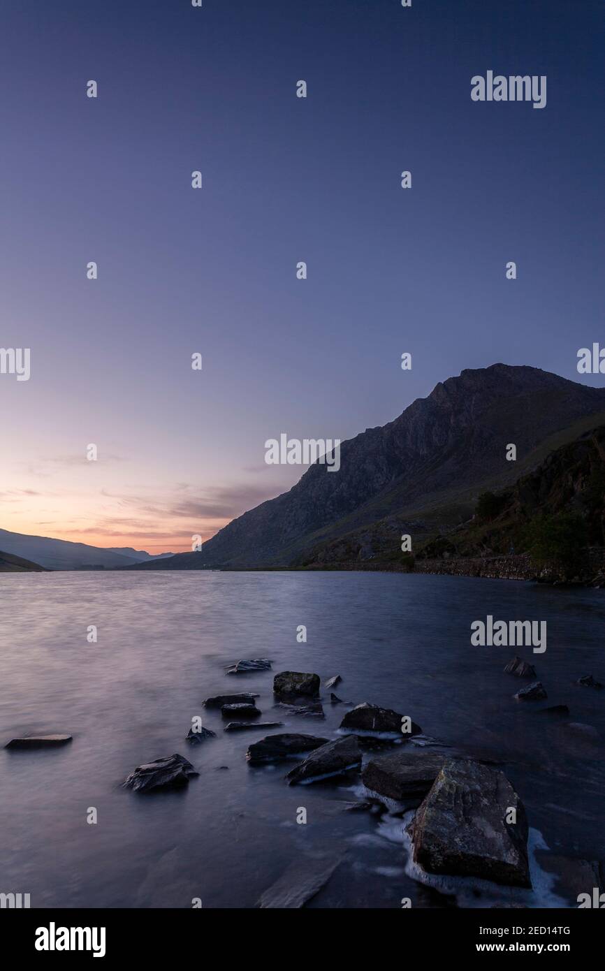Dawn breaking over Llyn Ogwen, Snowdonia, North Wales Stock Photo