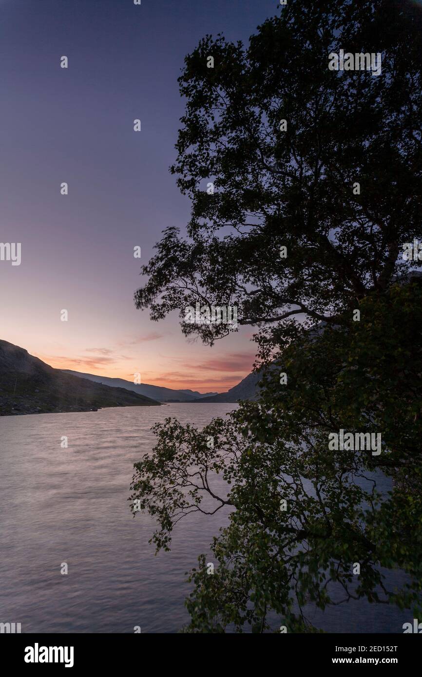 Dawn breaking over Llyn Ogwen, Snowdonia, North Wales Stock Photo