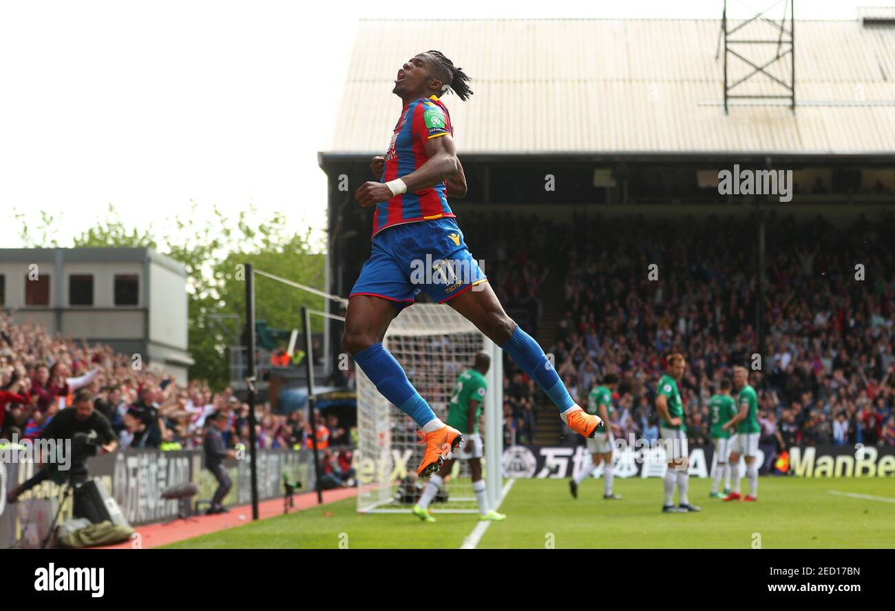 Soccer Football - Premier League - Crystal Palace vs West Bromwich Albion - Selhurst Park, London, Britain - May 13, 2018 Crystal Palace's Wilfried Zaha celebrates scoring their first goal REUTERS/Hannah McKay EDITORIAL USE ONLY. No use with unauthorized audio, video, data, fixture lists, club/league logos or "live" services. Online in-match use limited to 75 images, no video emulation. No use in betting, games or single club/league/player publications. Please contact your account representative for further details. Stock Photo
