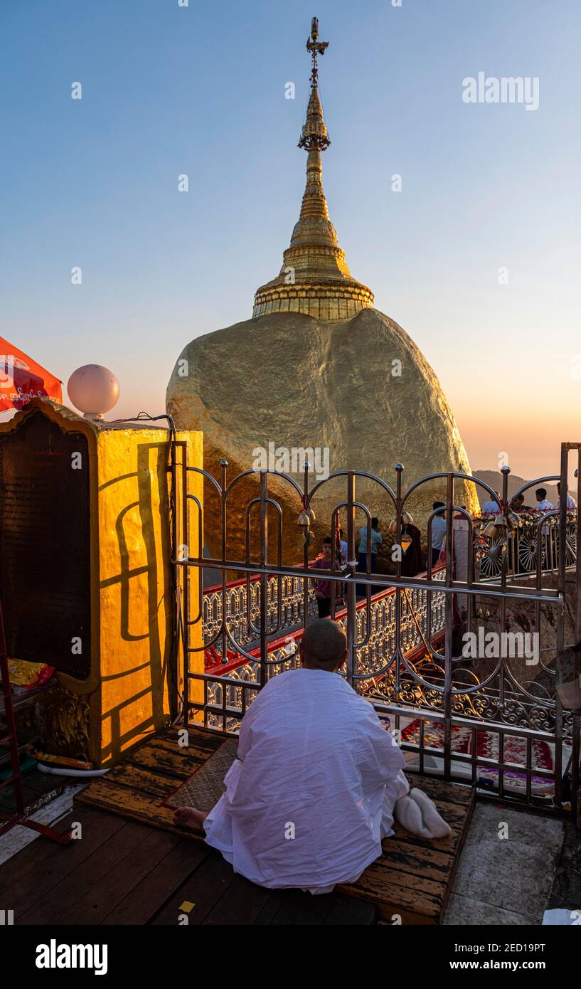 Monk praying at the Kyaiktiyo Pagoda, golden rock, Mon state, Myanmar Stock Photo