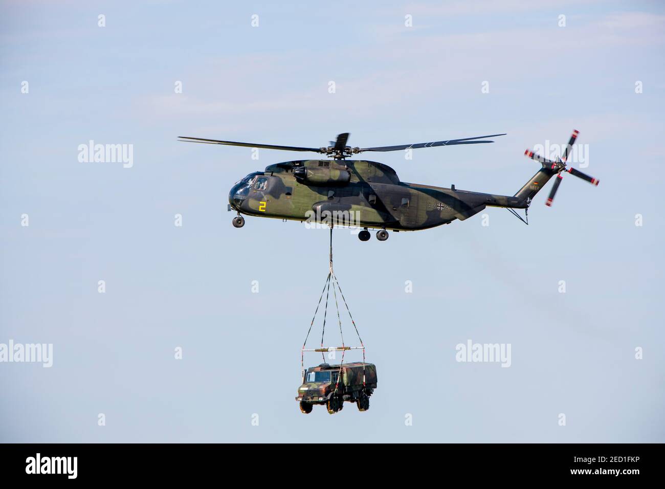 Bundeswehr helicopter with a truck, Laupheim, Baden-Wuerttemberg, Germany Stock Photo