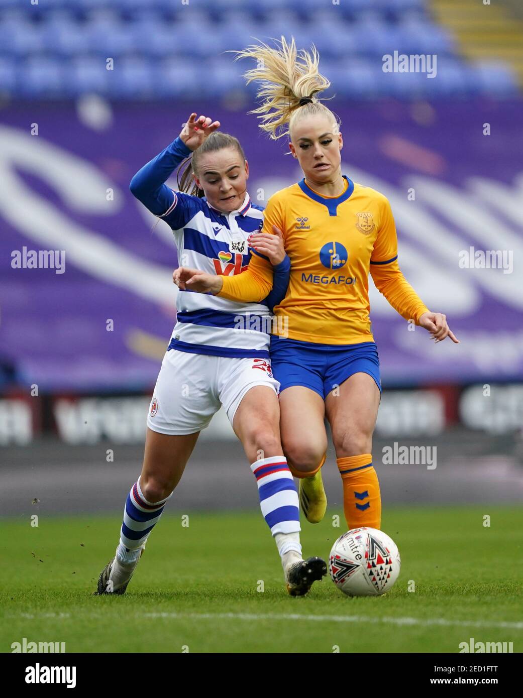 Reading's Lily Woodham and Everton's Alisha Lehmann (right) battle for the ball during the FA Women's Super League match at the Madejski Stadium, Reading. Picture date: Friday February 12, 2021. Stock Photo