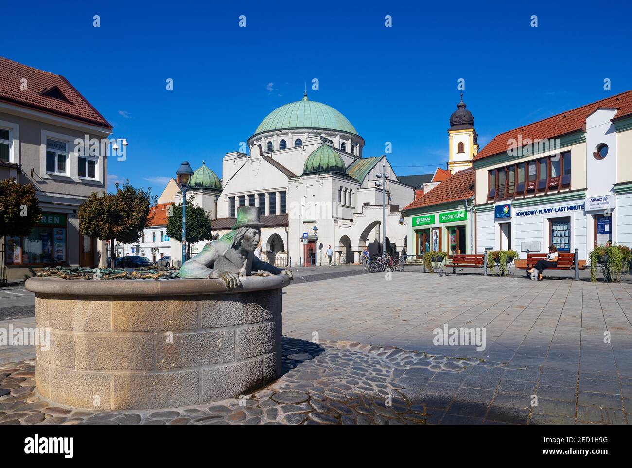 Fountain with fountain figure Vodnik, The Water Sprite, Jewish Synagogue, Main Square, Trencin, Slovakia Stock Photo