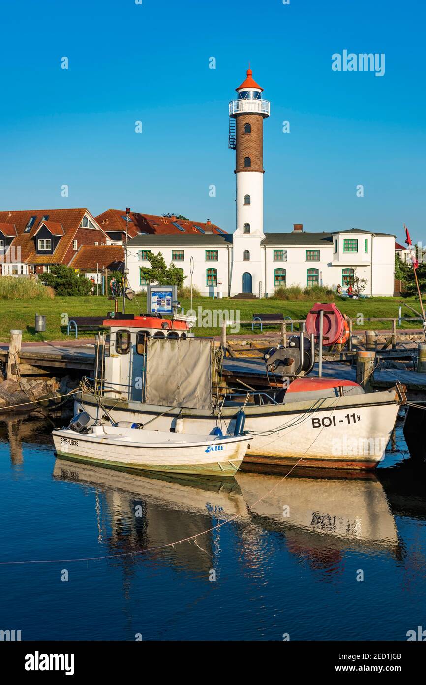 Fishing boats and lighthouse in the harbour of Timmendorf on the island of Poel, Mecklenburg-Vorpommern, Germany Stock Photo