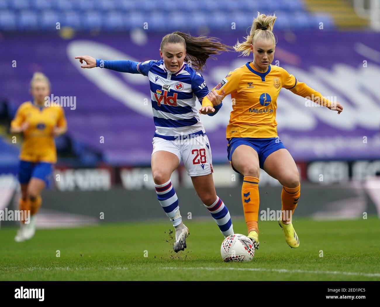 Reading's Lily Woodham (left) and Everton's Alisha Lehmann battle for the ball during the FA Women's Super League match at the Madejski Stadium, Reading. Picture date: Sunday February 14, 2021. Stock Photo