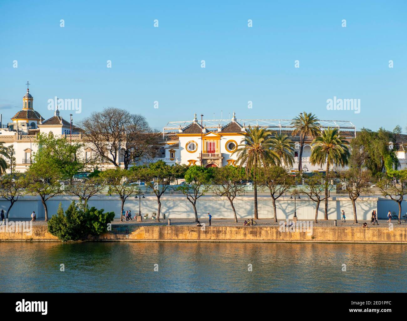 View over the river Rio Guadalquivir to the bullring Plaza de toros de la Real Maestranza de Caballeria de Sevilla, Sevilla, Andalusia, Spain Stock Photo