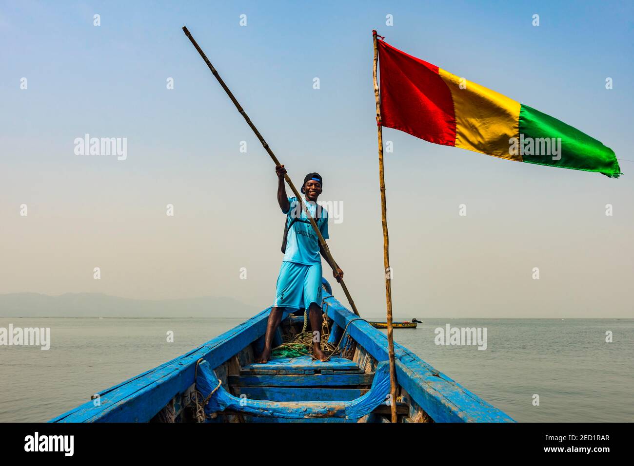 Guinean flag on a boat, Conakry, Republic of Guinea, Guinea Conakry Stock Photo