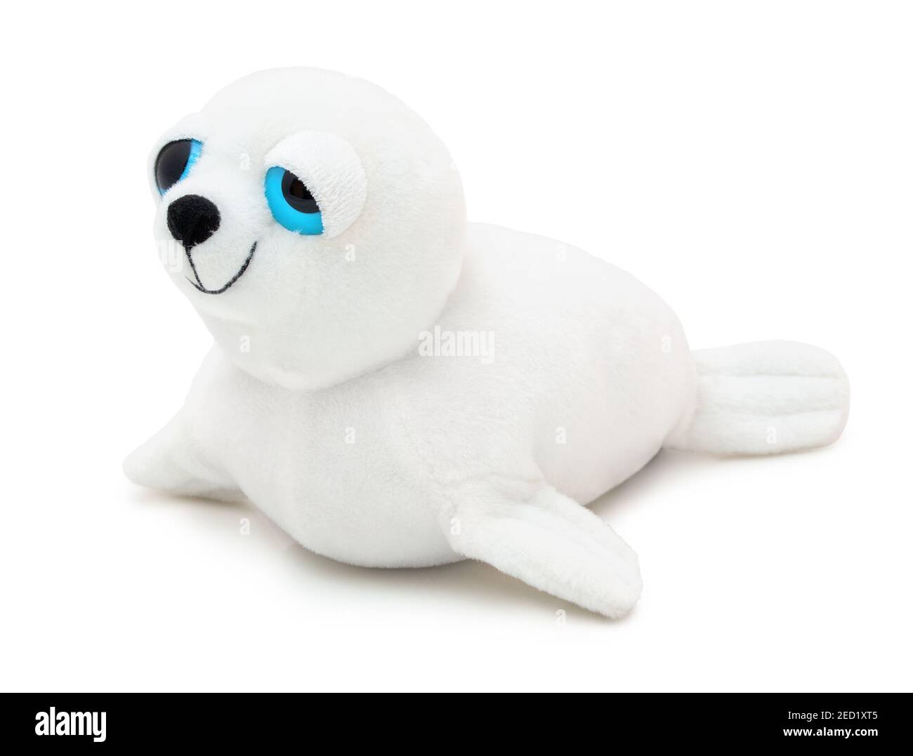 Cute seal doll with big blue eyes isolated on white background with shadow. Playful seal on white underlay. Plush stuffed puppet toy for children. Pla Stock Photo