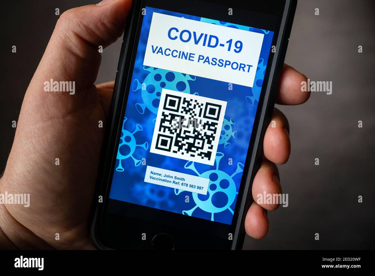Conceptual design of possible electronic Covid-19 vaccination passport using QR code on a smart phone. Stock Photo
