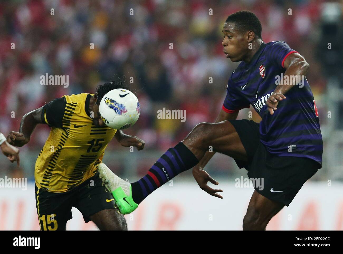 Football Malaysia All Stars Xi V Arsenal Pre Season Friendly Bukit Jalil National Stadium Kuala Lumpur Malaysia 24 7 12 Arsenal S Chuks Aneke R In Action With Malaysia Xi S Gary Steven Robbat