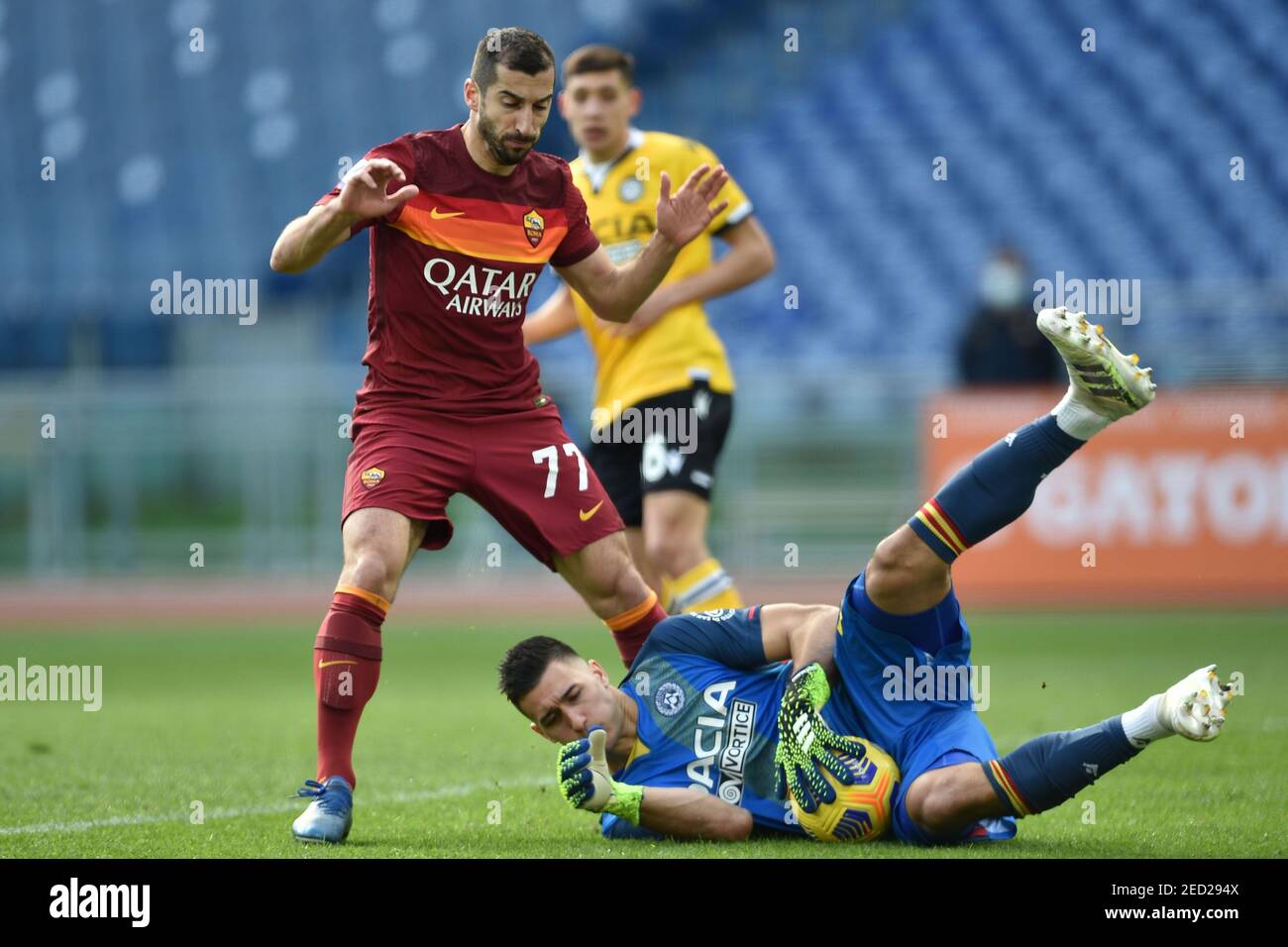 ROME, Italy. , . February 14 : Henrikh Mikitarian (L) of AS Roma in action  against Goalkeeper Juan Musso (R) of Udinese during AS Roma vs Udinese  Calcio, Italian football Serie A