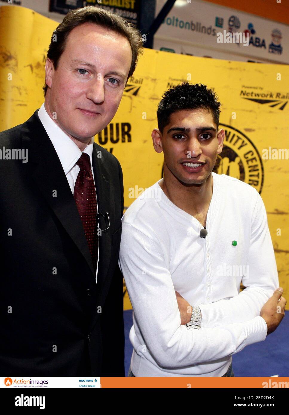 Boxing - Amir Khan launches 'Gloves' community centre in Bolton - Gloves Community Gym and Community Centre - 10/1/08  Amir Khan (R) at the launch with David Cameron MP  Mandatory Credit: Action Images / Jason Cairnduff  Livepic Stock Photo