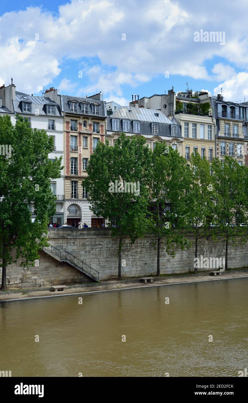 Seine river side terraced luxury residences, Seine river embankment, Paris, France Stock Photo