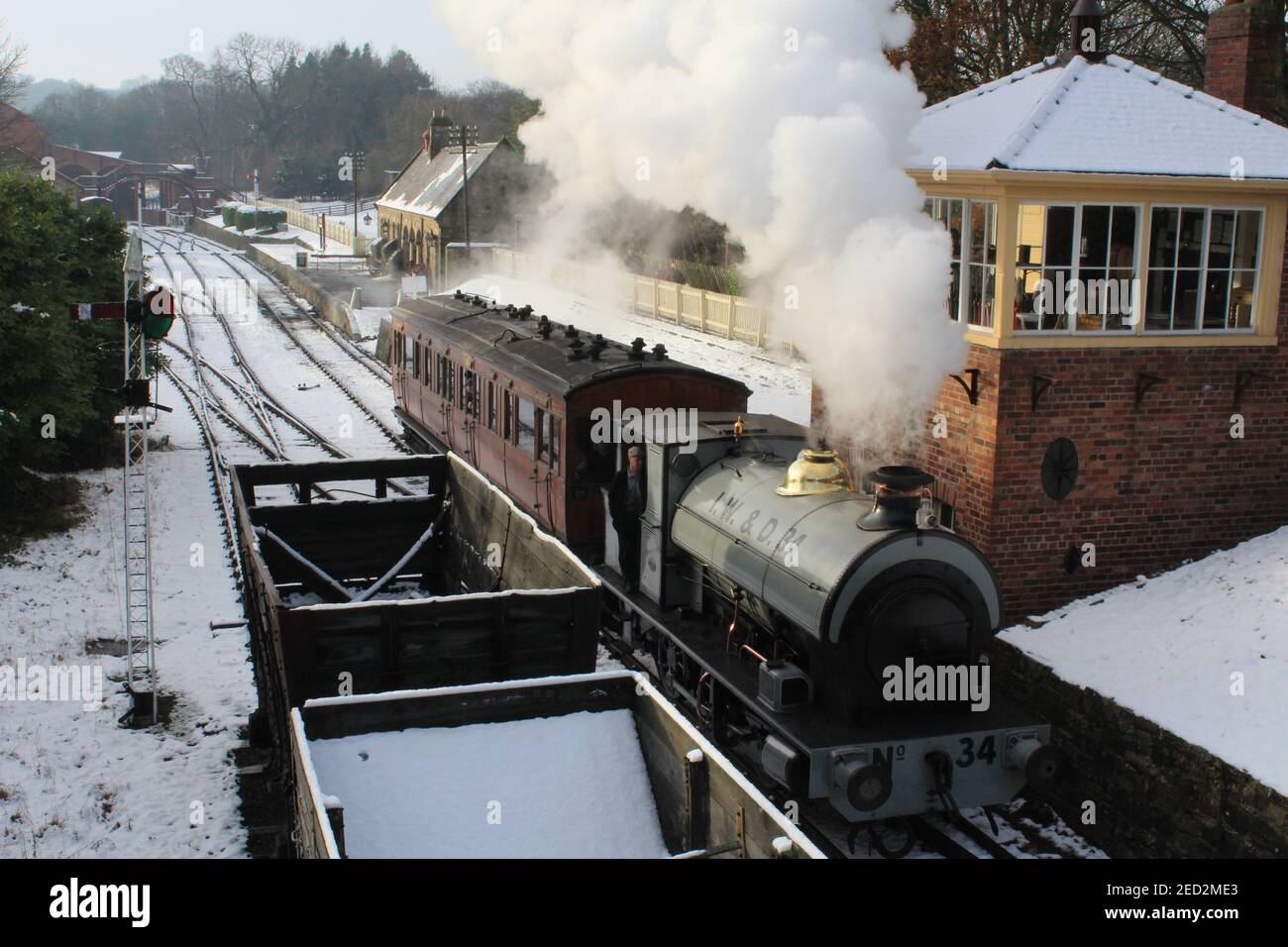 Steam Train on a crispwinters day on the North Yorkshire Moors Steam Railway coming into the station, Stock Photo