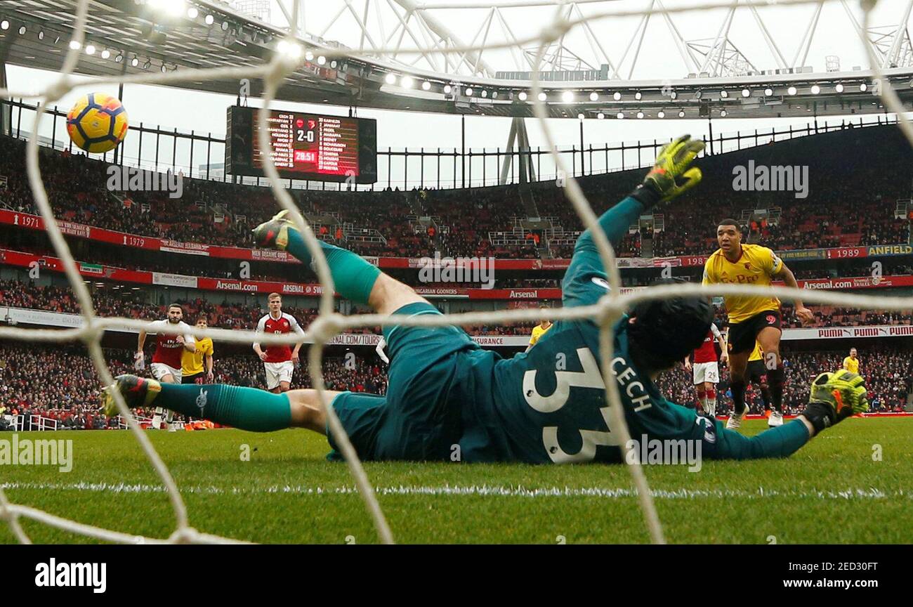 Soccer Football - Premier League - Arsenal vs Watford - Emirates Stadium, London, Britain - March 11, 2018   Arsenal's Petr Cech saves a penalty from Watford's Troy Deeney    REUTERS/Eddie Keogh    EDITORIAL USE ONLY. No use with unauthorized audio, video, data, fixture lists, club/league logos or 'live' services. Online in-match use limited to 75 images, no video emulation. No use in betting, games or single club/league/player publications.  Please contact your account representative for further details. Stock Photo