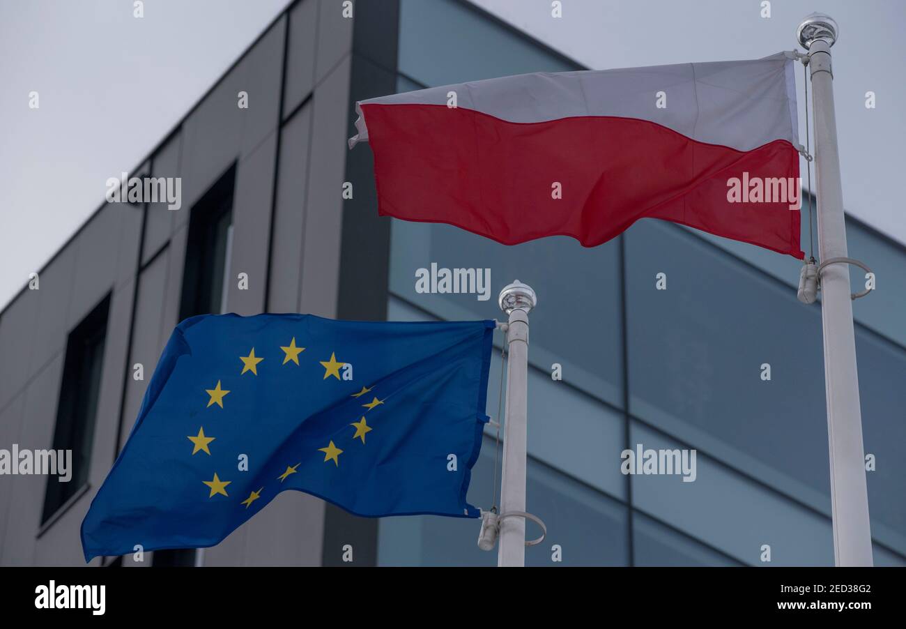 Warsaw, Warsaw, Poland. 14th Feb, 2021. An European Union and Polish national flag wave in the wind on February 14, 2021 in Warsaw, Poland. Credit: Aleksander Kalka/ZUMA Wire/Alamy Live News Stock Photo
