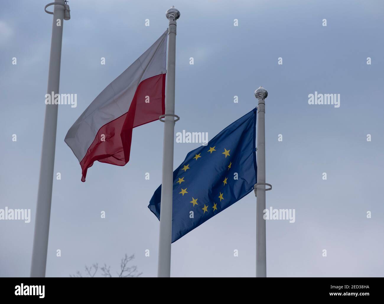 Warsaw, Warsaw, Poland. 14th Feb, 2021. An European Union and Polish national flag wave in the wind on February 14, 2021 in Warsaw, Poland. Credit: Aleksander Kalka/ZUMA Wire/Alamy Live News Stock Photo