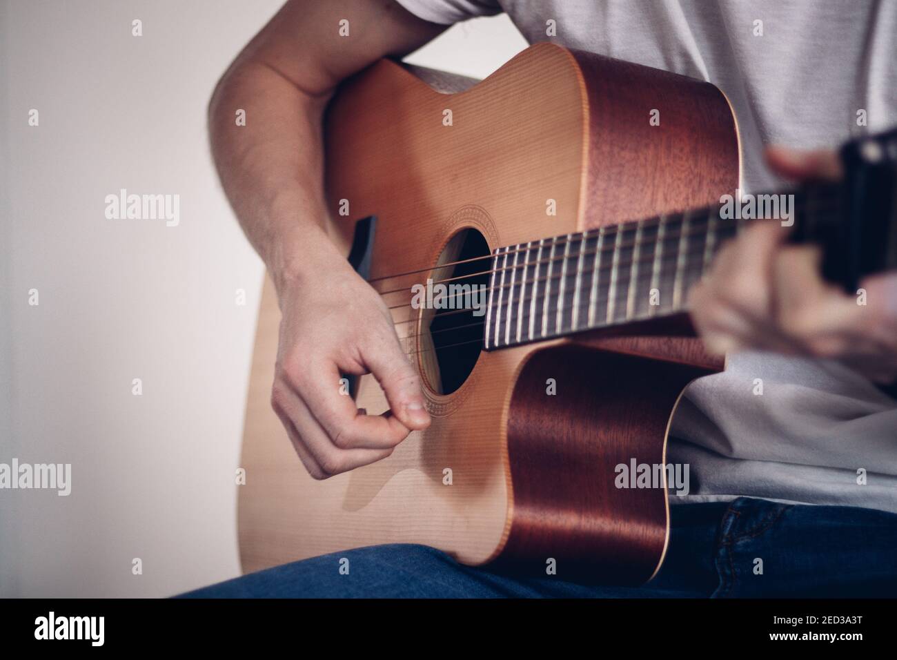 Singer Playing Instrument Confident male singer sitting hi-res stock photography and images - Alamy