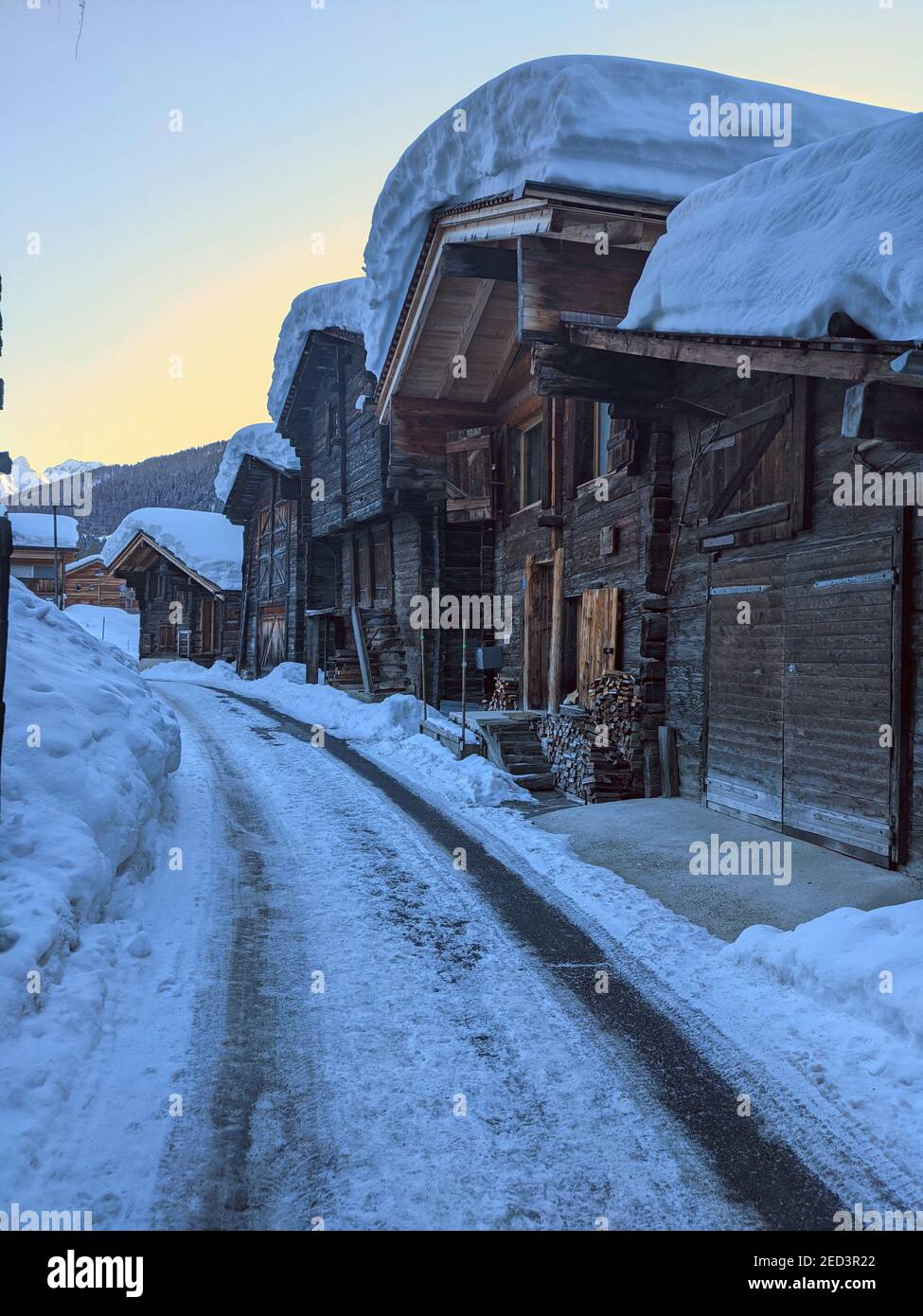 Swiss mountain village in Valais, old beautiful wooden houses Stock Photo