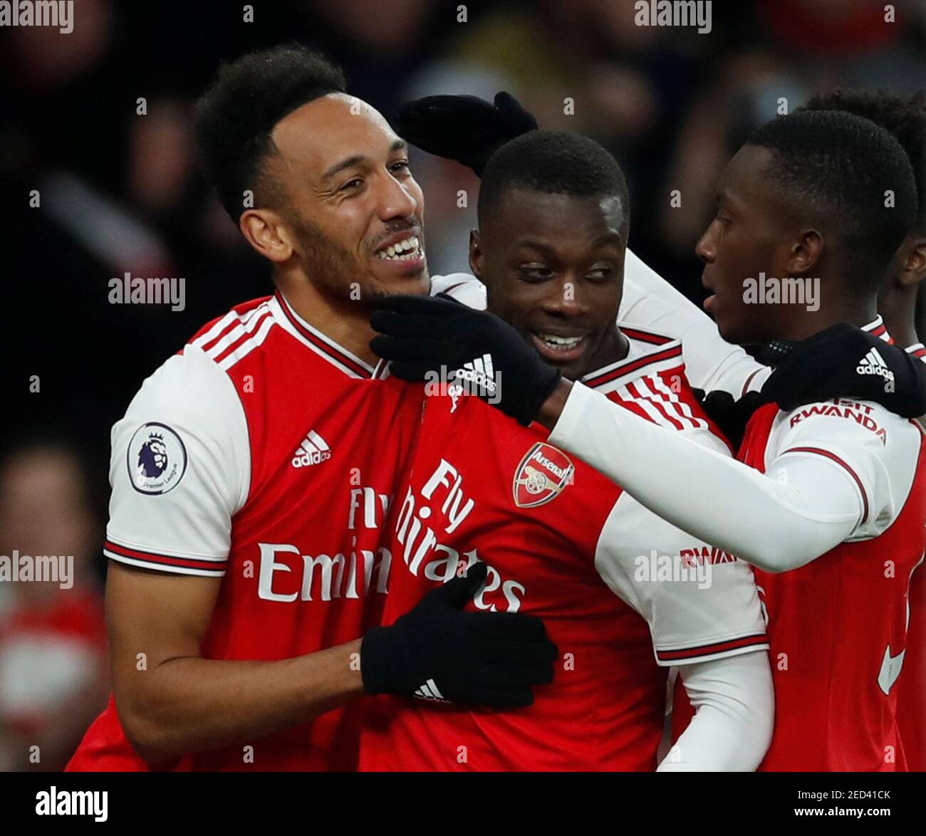 Soccer Football - Premier League - Arsenal v Everton - Emirates Stadium,  London, Britain - February 23, 2020 Arsenal's Pierre-Emerick Aubameyang  celebrates scoring their third goal with Nicolas Pepe and Eddie Nketiah