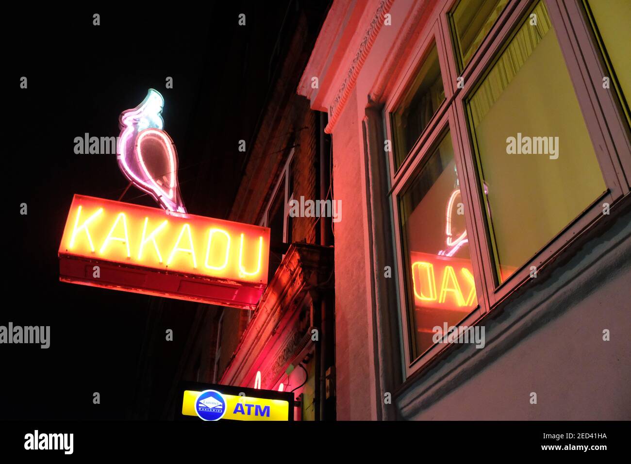 COPENHAGEN, DENMARK - 8TH JANUARY 2019: An illuminated neon bar sign for Kakadu exclusive strip club. Stock Photo