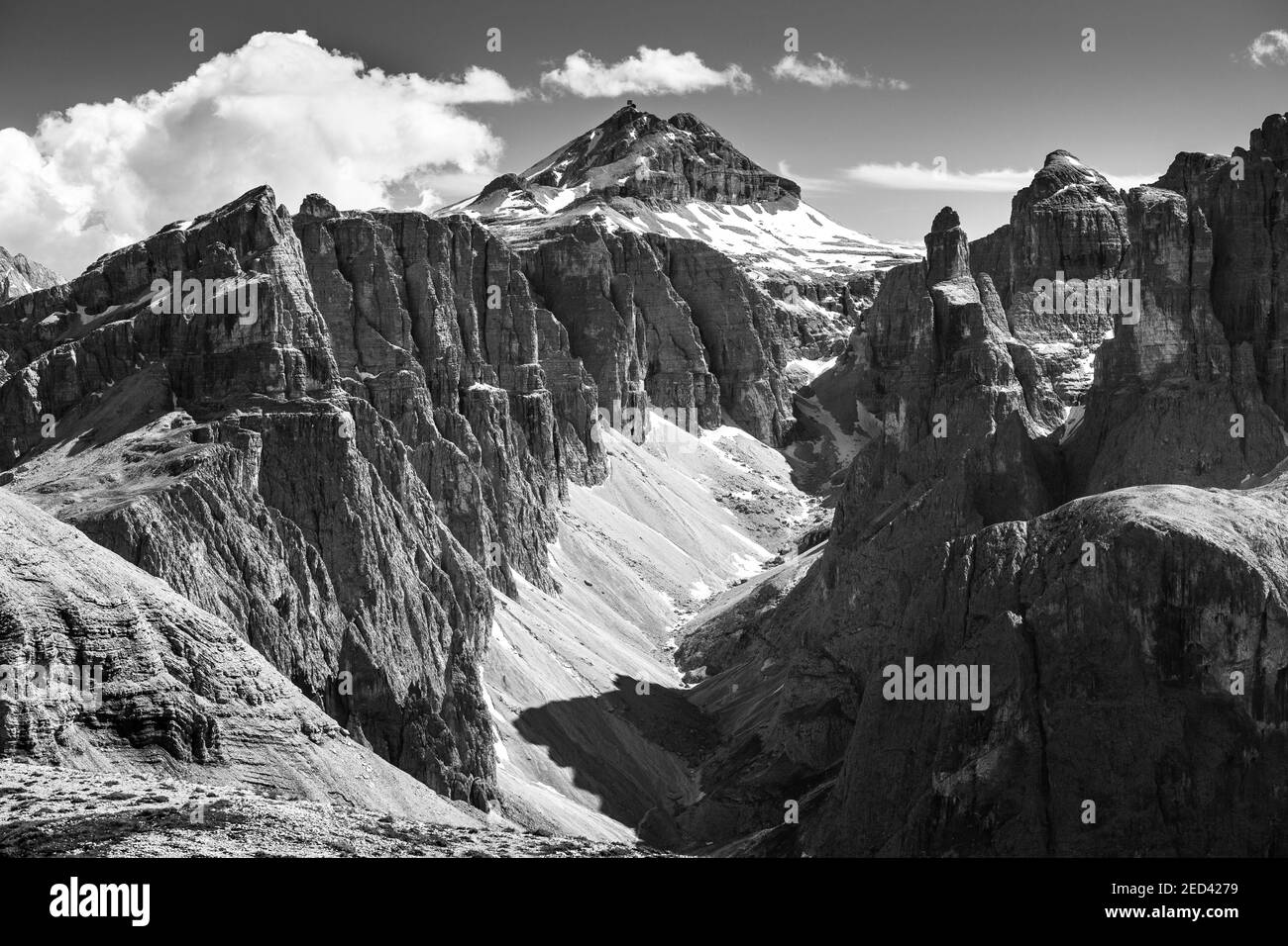 View on the Sella mountain group, Val Mezdì rock valley an Piz Boè peak. The Gardena Dolomites. Italian Alps. Europe. Black white. Stock Photo