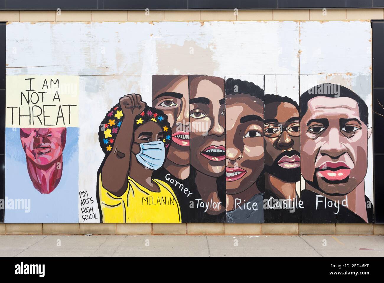 Painted murals on boards over a storefront windows during the civil unrest after the killing of George Floyd in Minneapolis, Minnesota.  The portraits Stock Photo