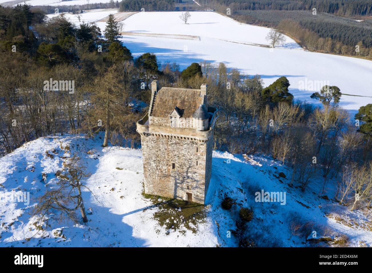 Aerial view of Fatlips Castle a Border Peel Tower situated at the top of Minto Crags near Ancrum, Scottish Borders, United Kingdom. Stock Photo