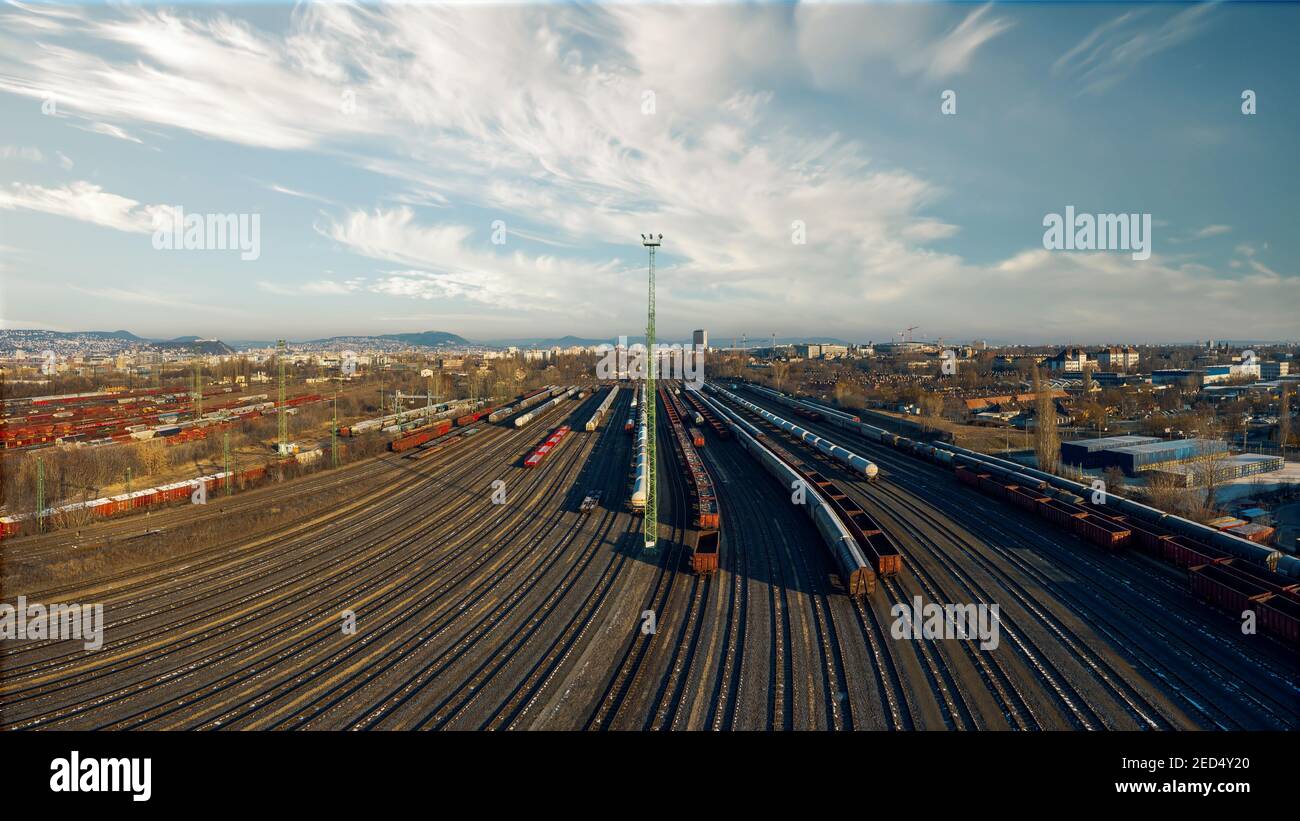 marshalling yard for railway cargo trains in Budapest. This is on Ferencvaros district. Aerial photo about lot empty and full trains. Stock Photo