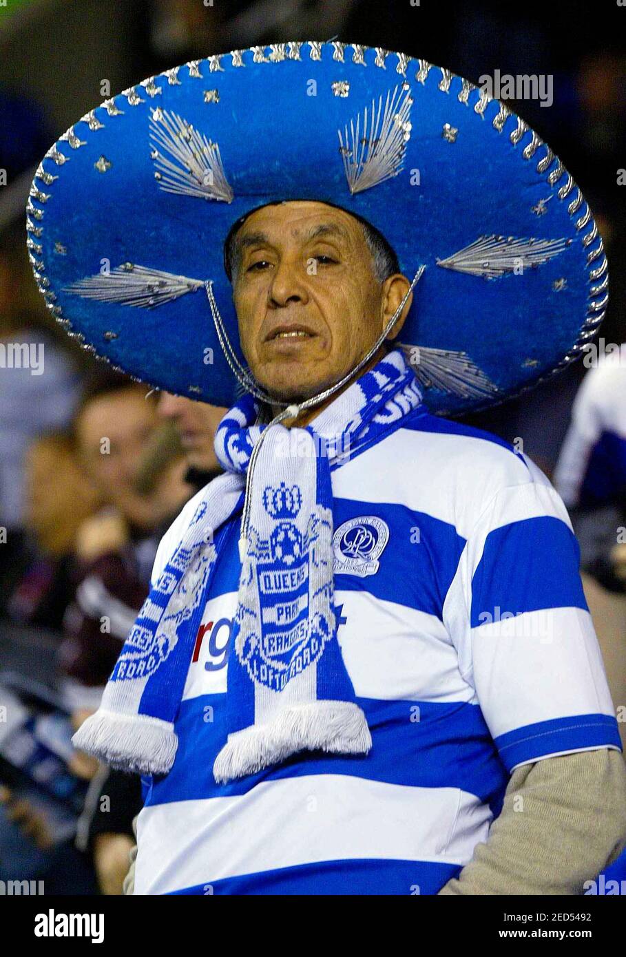 A Queens Park Rangers fan wearing a 