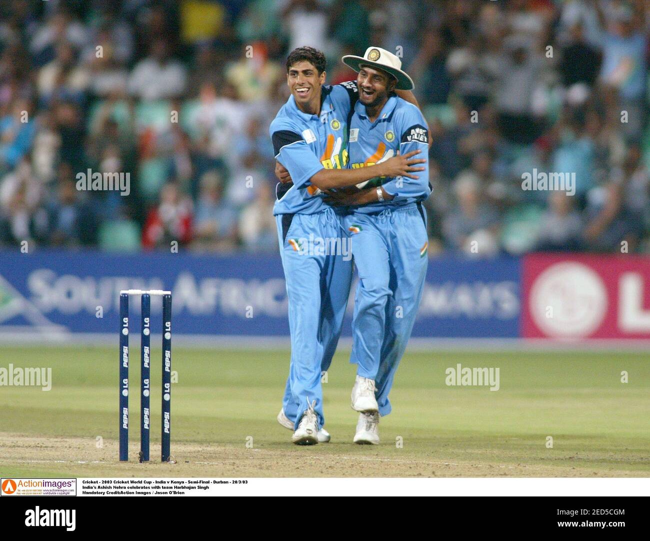 India S Ashish Nehra Celebrates With Team Mate Virender Sehwag After Taking Wicket Of England S Nasser Hussain In Durban Stock Photo Alamy