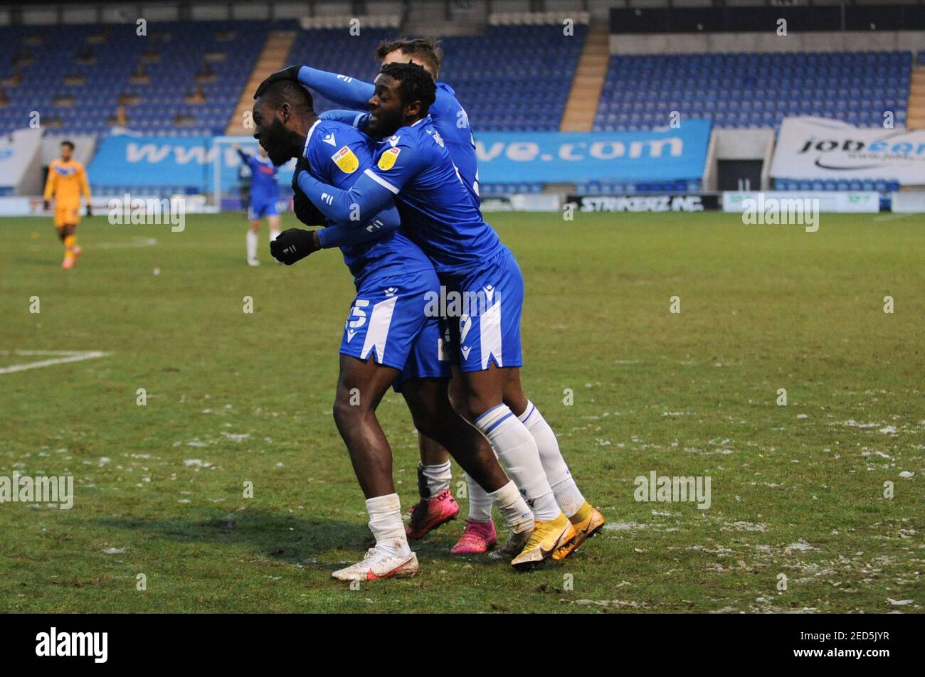 Colchester, UK. 14th February, 2021. Colchesters Frank Nouble celebrates his goal with teammate Aramide Oteh and Ryan Clampin during the Sky Bet League 2 match between Colchester United and Mansfield Town at the Weston Homes Community Stadium, Colchester on Sunday 14th February 2021. (Credit: Ben Pooley | MI News) Credit: MI News & Sport /Alamy Live News Stock Photo