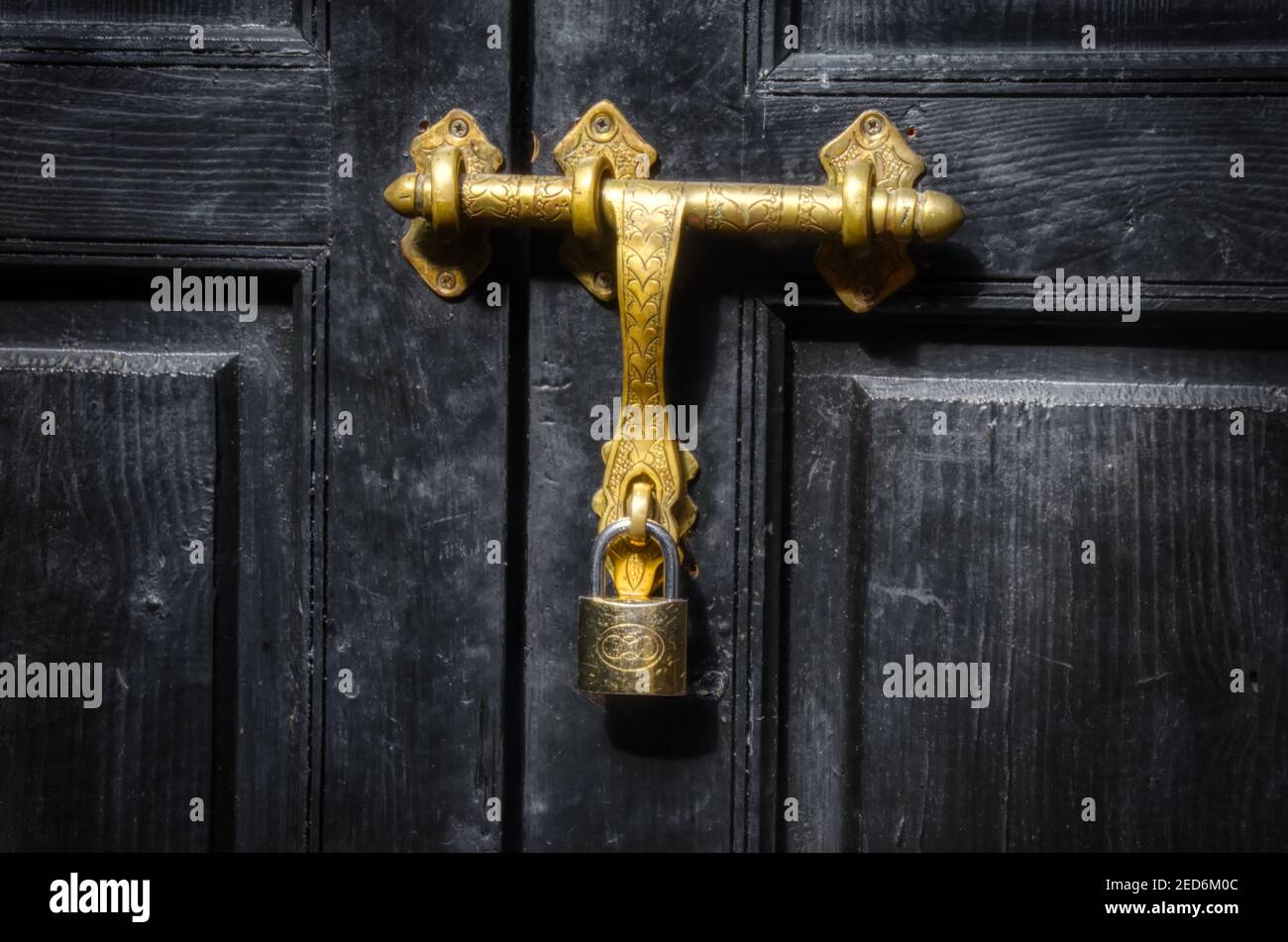 Locked with a golden lock Stock Photo Alamy