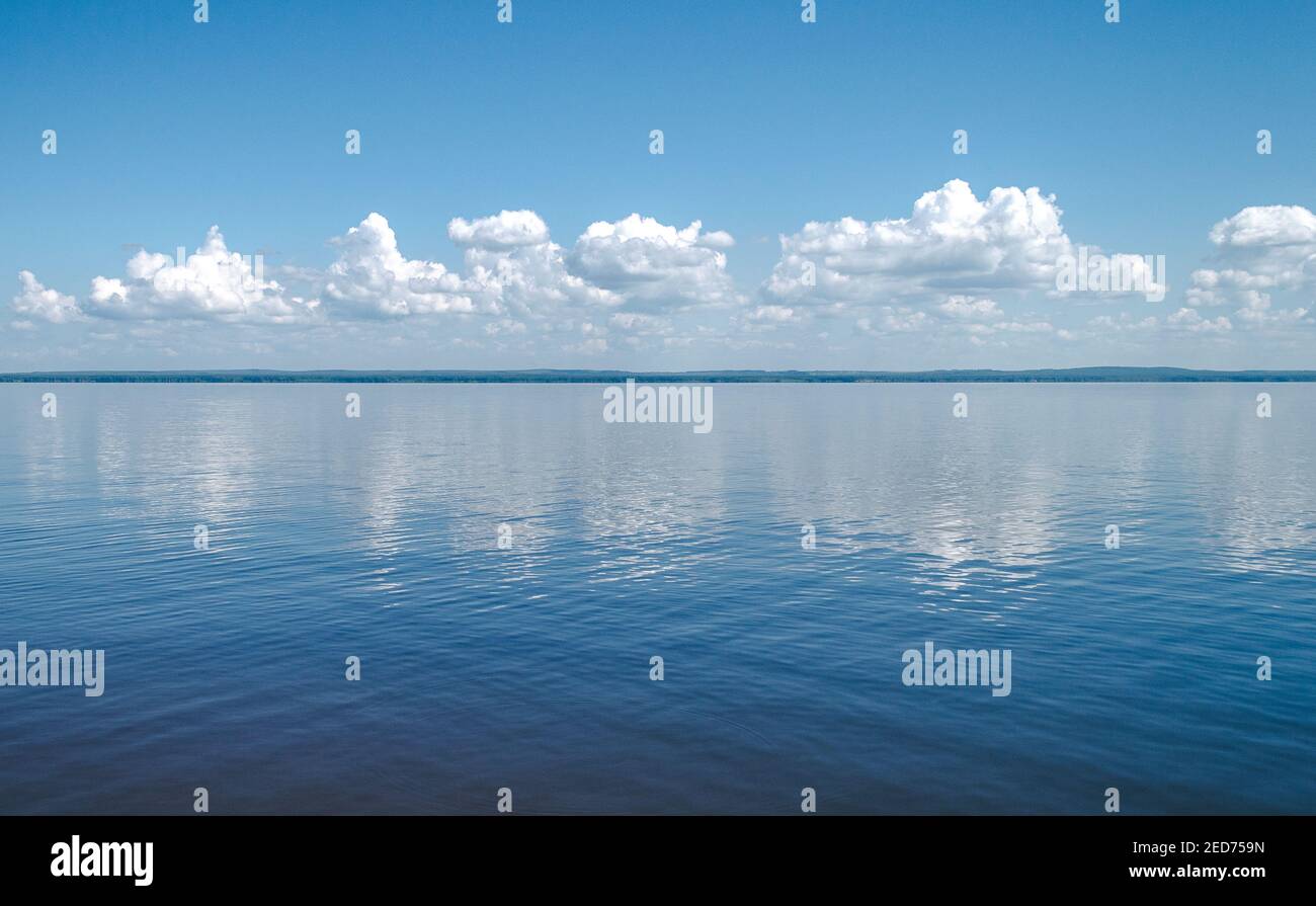 Sky blue reflected water background hi-res stock photography and images ...