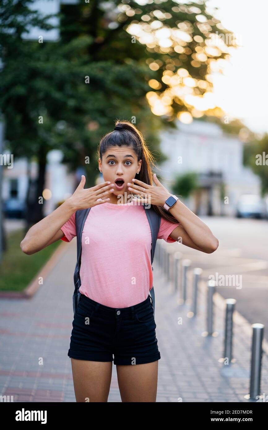 Summer lifestyle fashion portrait of young surprised woman Stock Photo ...