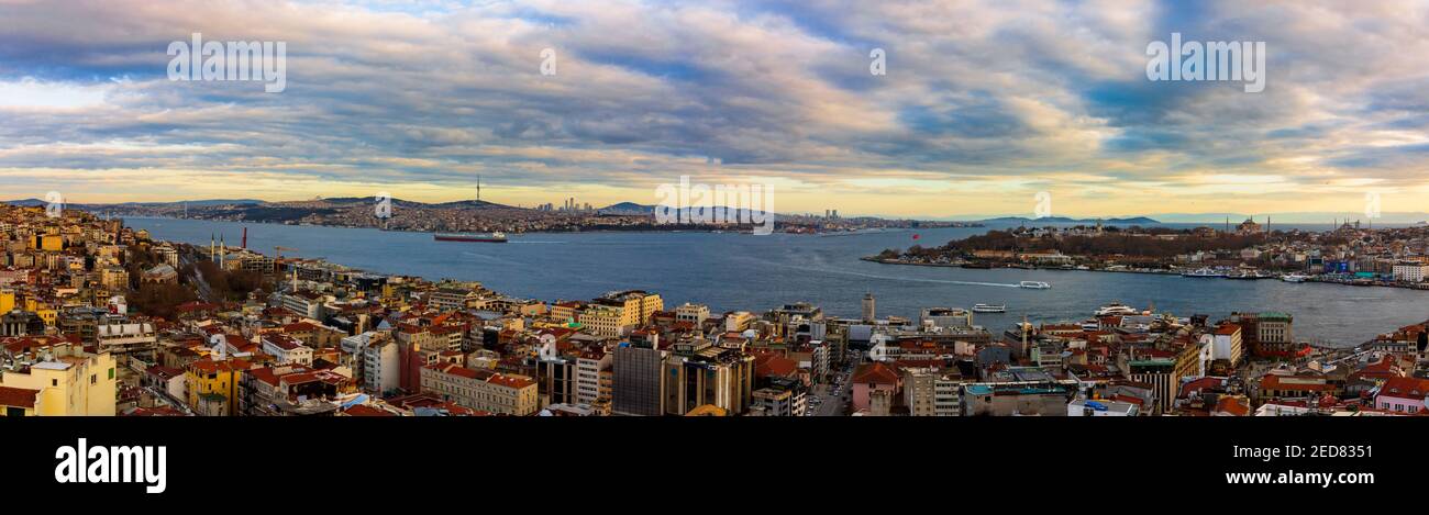 Panoramic view of Istanbul at sunset from Galata Tower. Anatolian side, Bosphorus, Historical Peninsula of the Istanbul and Karakoy on the scene. Dram Stock Photo