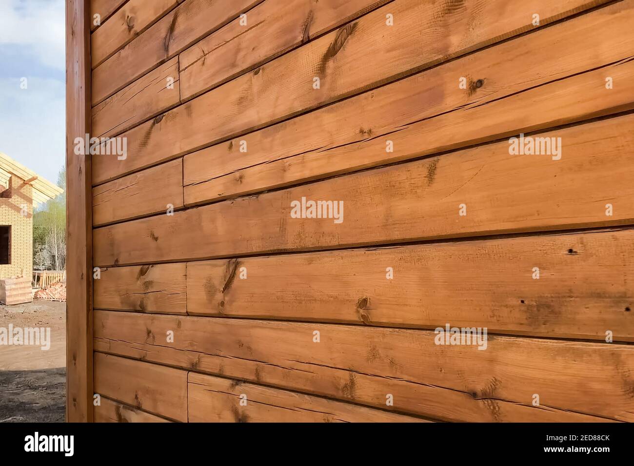 Details and elements of a wooden house made of timber. The construction