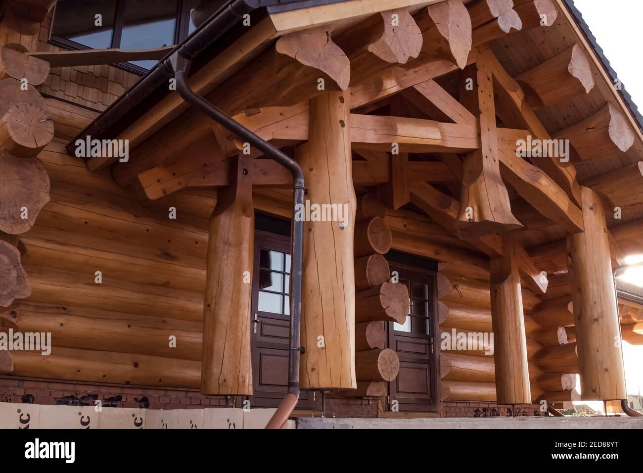 Details and elements of a wooden house made of timber. The construction