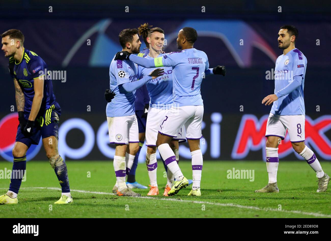 Soccer Football - Champions League - Group C - GNK Dinamo Zagreb v Manchester City - Stadion Maksimir, Zagreb, Croatia - December 11, 2019  Manchester City's Phil Foden celebrates scoring their fourth goal with teammates          REUTERS/Antonio Bronic Stock Photo